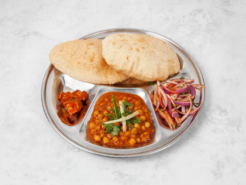 Authentic Chole Bhature spiced chickpeas with bhatura at Taste of Himalayan Indian takeaway in Rowley Regis, Blackheath near Birmingham