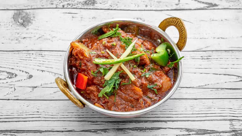 Traditional Halal Lamb Kadai curry with bell peppers at Taste of Himalayan Indian restaurant in Rowley Regis, Blackheath near Birmingham
