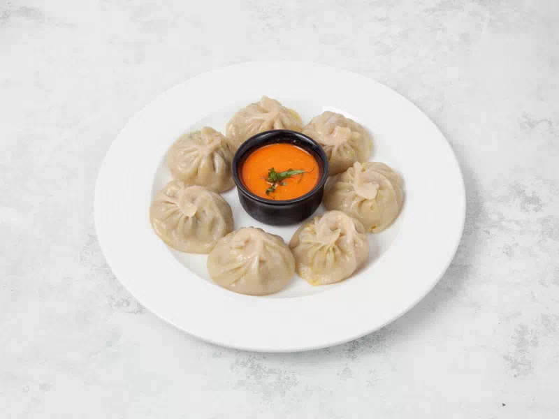 Authentic Halal Chicken Steam Momos with spicy achar dip at Taste of Himalayan Nepalese Restaurant in Rowley Regis, Blackheath near Birmingham