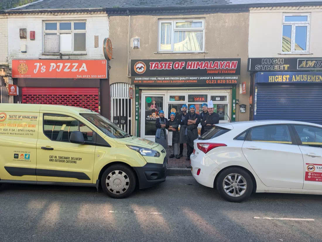 The Taste of Himalayan team outside the award-winning Nepalese restaurant and Indian takeaway on High Street, Rowley Regis, Blackheath near Birmingham